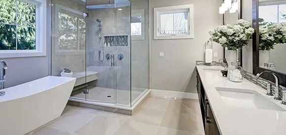 Luxurious bathroom remodel in Manchester, MA, with spa-inspired walk-in shower and premium tiles.