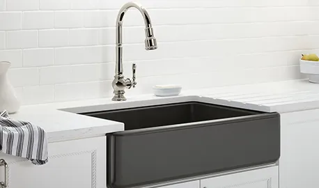 Modern kitchen sink with updated fixtures, highlighting plumbing services in Salem, MA.