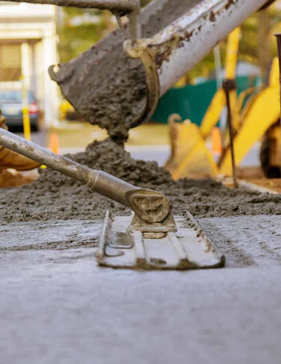 Cement being poured for a concrete construction project
